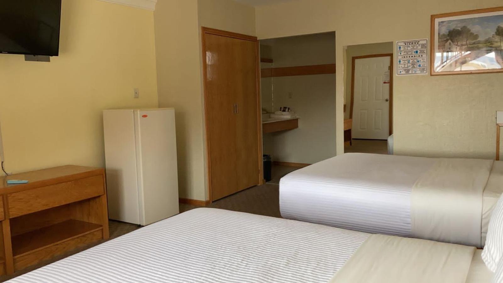 La Huerta Inn & Suites Ciudad Cuauhtemoc  Номер фото